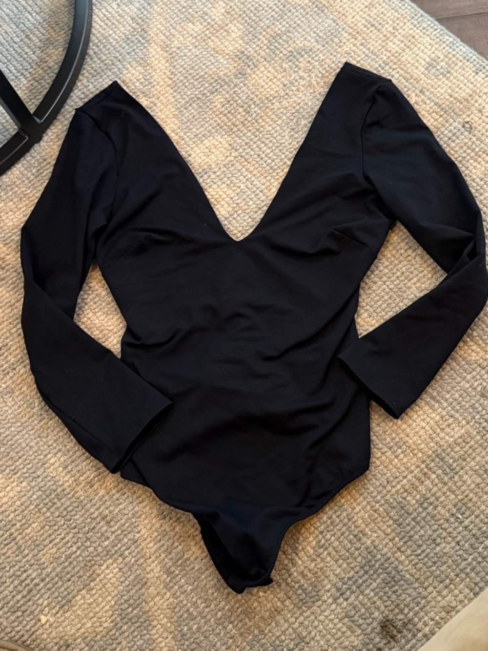 Super flattering black long sleeve bodysuit free people